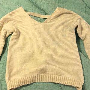A cozy and cute beige sweater!